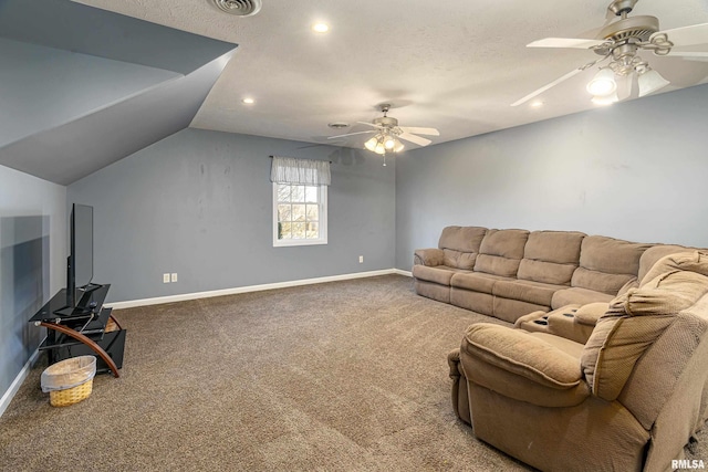 living room with lofted ceiling, a textured ceiling, ceiling fan, and carpet flooring