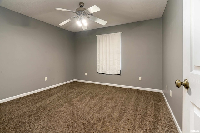 empty room with carpet and ceiling fan