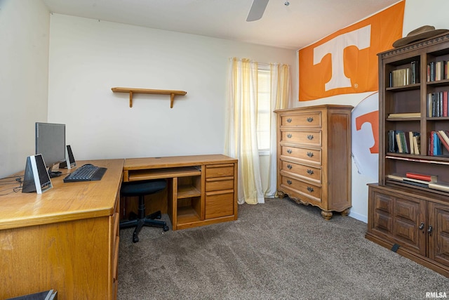 office space with dark colored carpet and ceiling fan