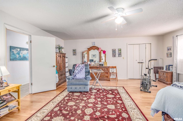 2857 State Route 161st Hwy, Centralia, IL 62801 - bedroom featuring a textured ceiling, light wood-type flooring, and a ceiling fan