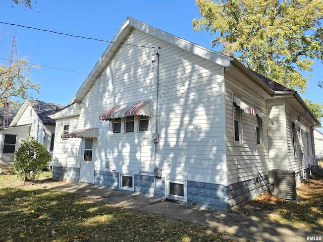 view of property exterior featuring central air condition unit