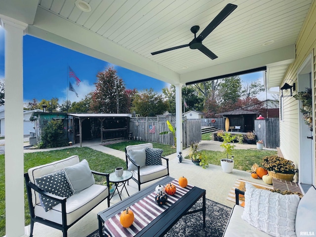 view of patio featuring an outdoor hangout area and ceiling fan