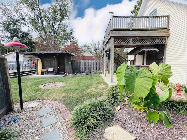 view of yard with a balcony and a patio area