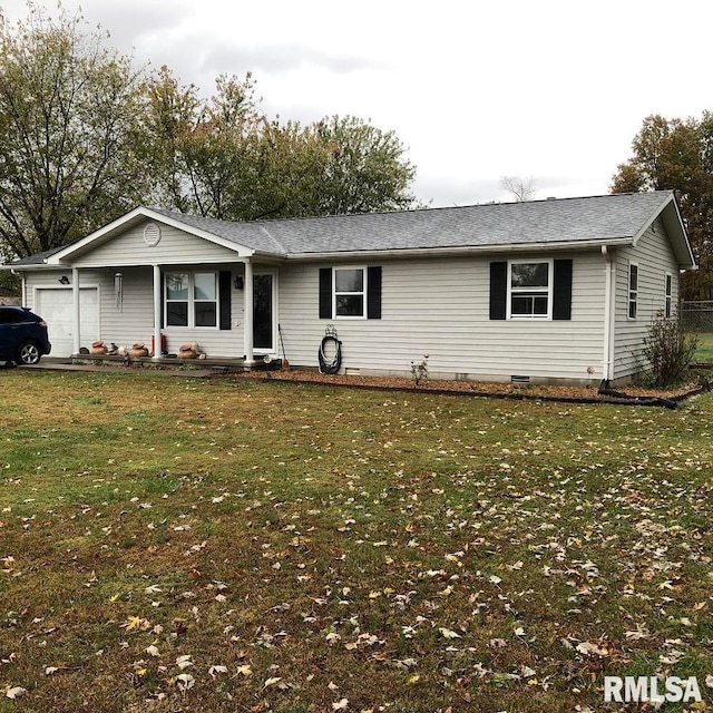 ranch-style home with a garage and a front yard