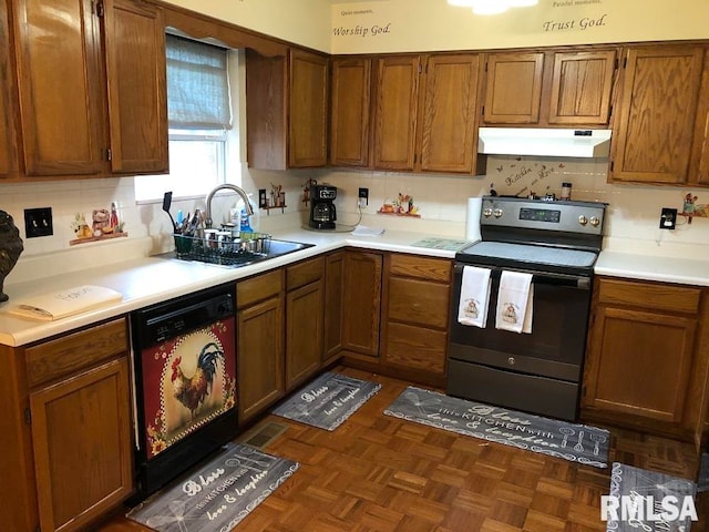 kitchen featuring black dishwasher, sink, tasteful backsplash, and electric range