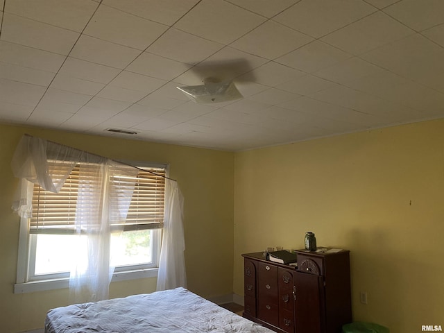 bedroom featuring visible vents
