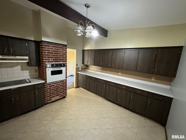 kitchen featuring decorative light fixtures, a chandelier, dark brown cabinets, black electric cooktop, and oven