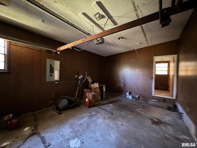 interior space featuring concrete flooring and electric panel