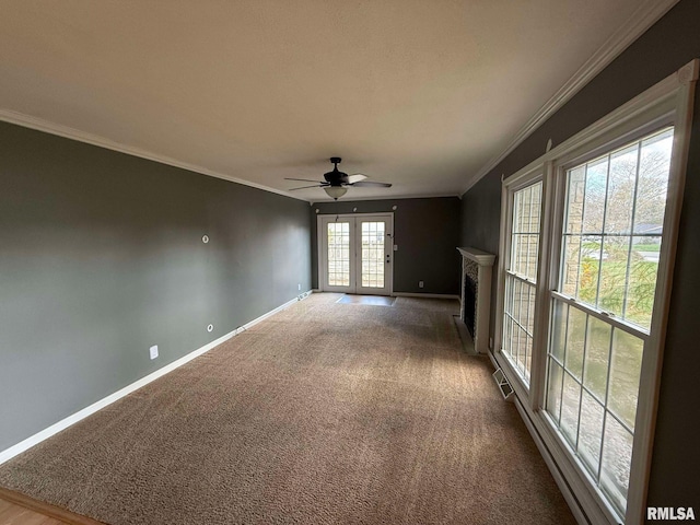 interior space featuring french doors, ceiling fan, and crown molding