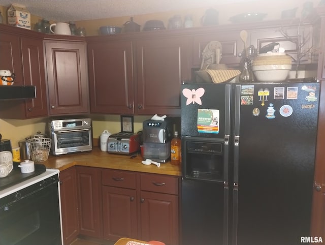 kitchen with black fridge