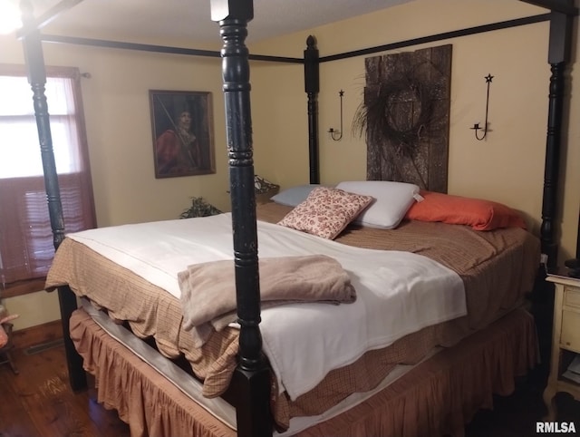 bedroom featuring wood-type flooring