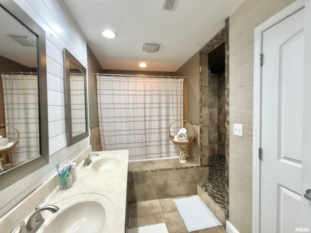 bathroom with tile patterned floors, a shower with curtain, and vanity