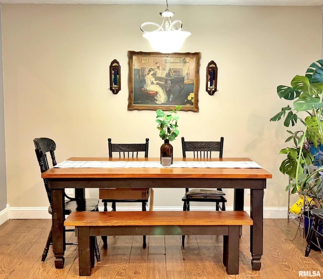 dining space featuring light hardwood / wood-style flooring