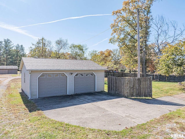 garage with a lawn