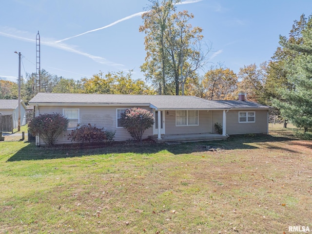 single story home featuring a front yard