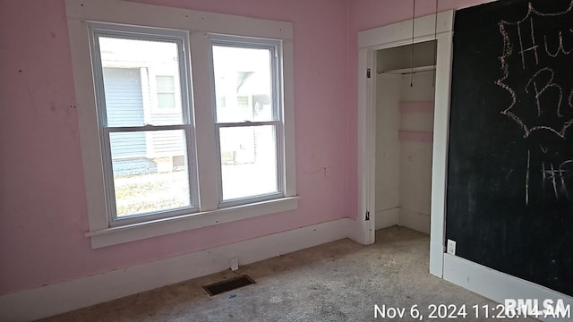 unfurnished bedroom with a closet