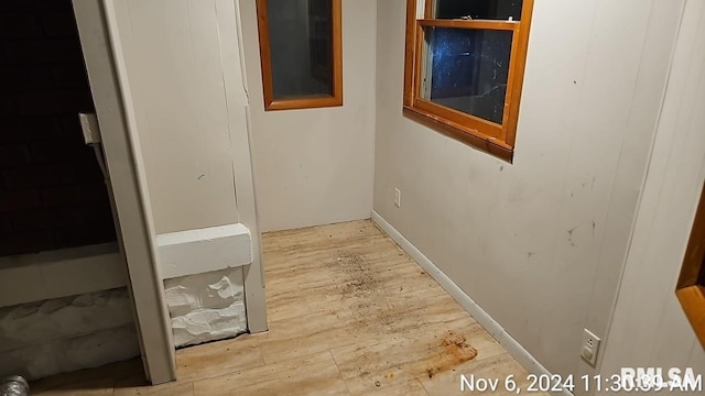 hall featuring light hardwood / wood-style flooring