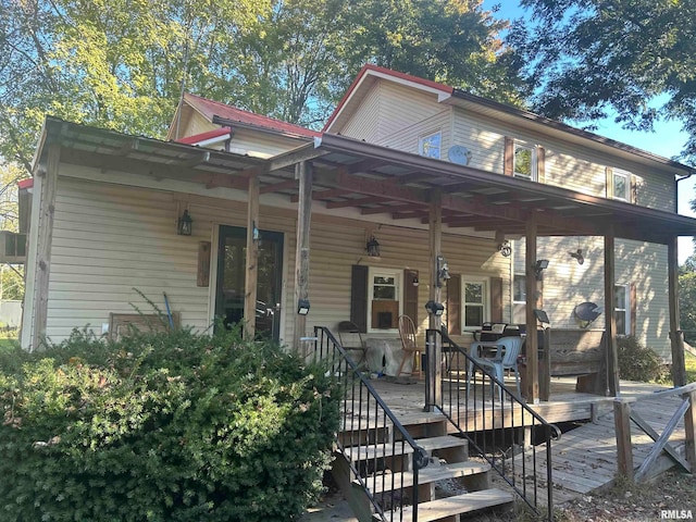 view of front of house with a wooden deck