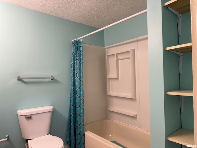 bathroom featuring a textured ceiling, shower / bath combo, and toilet