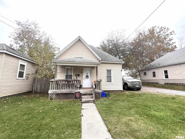 416 S Washington St, Carbondale, IL 62901 - view of front of house with a porch and a front lawn