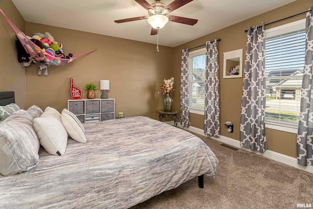 bedroom with carpet floors and ceiling fan