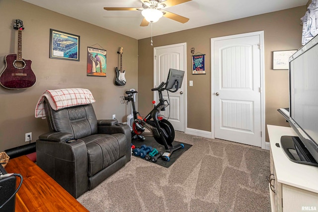 exercise room featuring carpet and ceiling fan