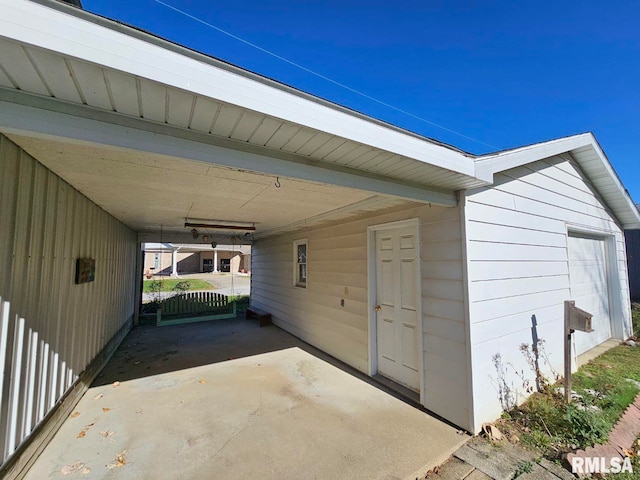 exterior space with a carport