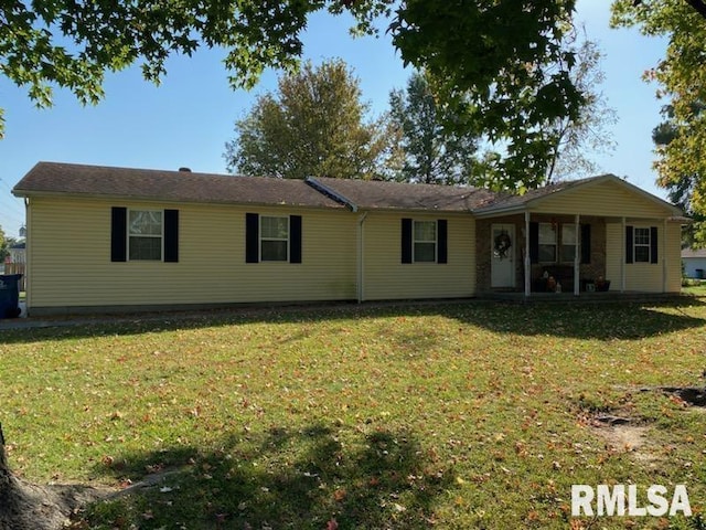 single story home featuring a front yard