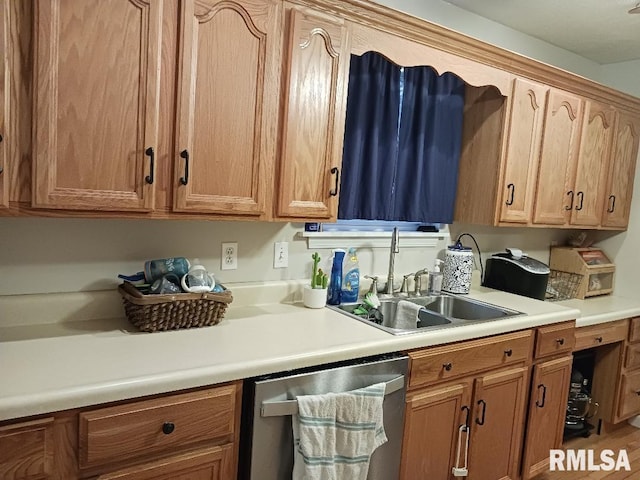 506 N Locust St, Sesser, IL 62884 - kitchen featuring dishwasher, a sink, and light countertops