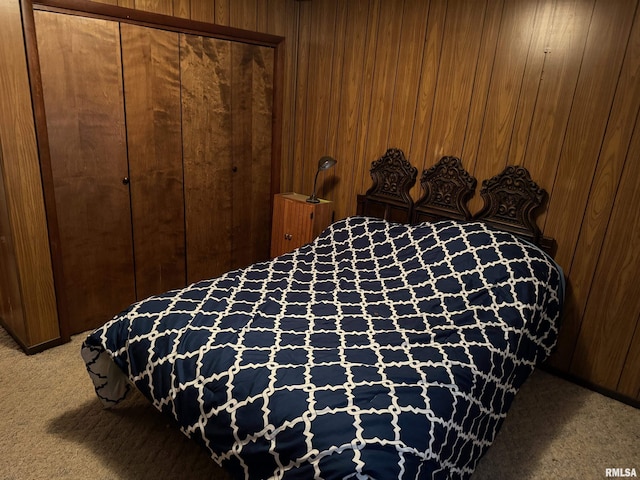 309 E Gelston St, Valier, IL 62891 - bedroom featuring carpet, wood walls, and a closet