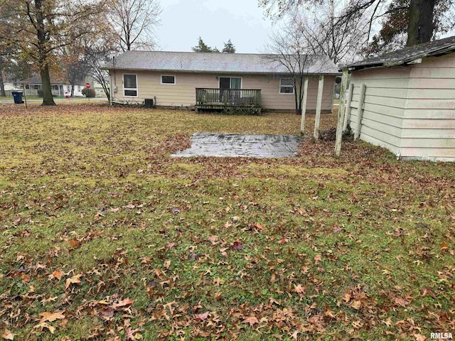 309 E Gelston St, Valier, IL 62891 - rear view of house with a deck, a yard, and a patio