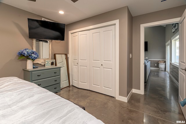 75 Bedrock Rdg, Elkville, IL 62932 - bedroom featuring a closet, finished concrete flooring, baseboards, and recessed lighting