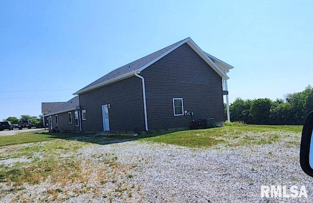 75 Bedrock Rdg, Elkville, IL 62932 - view of home's exterior with a lawn and central air condition unit