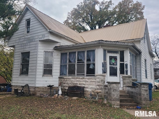 300 S Locust St, Mcleansboro, IL 62859 - view of front of house with a metal roof and entry steps