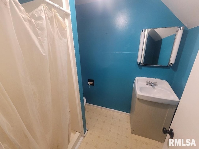 300 S Locust St, Mcleansboro, IL 62859 - full bath with tile patterned floors, a shower stall, and vanity