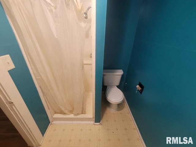 300 S Locust St, Mcleansboro, IL 62859 - bathroom with tile patterned floors and a shower stall