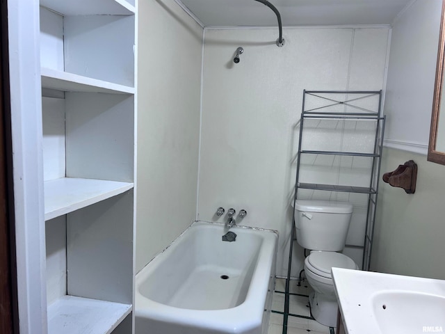 bathroom featuring a bathtub, vanity, and toilet