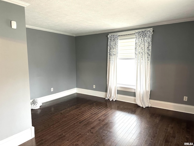 unfurnished room featuring ornamental molding, a textured ceiling, and hardwood / wood-style flooring