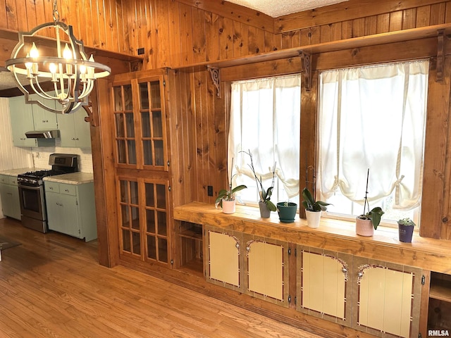 interior space featuring crown molding, dark wood-type flooring, and a textured ceiling