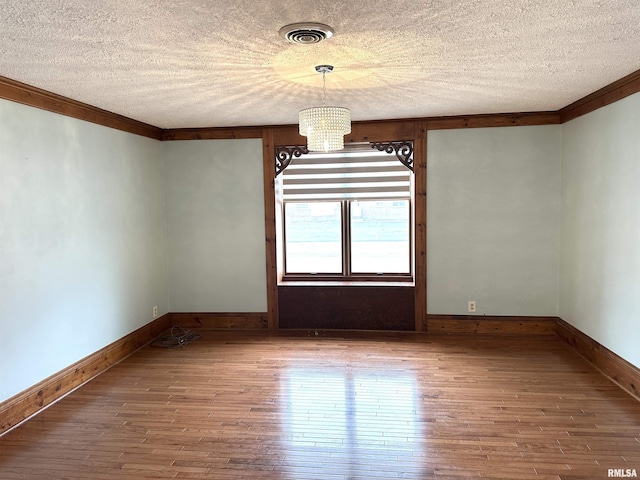 bedroom featuring ceiling fan, dark carpet, a textured ceiling, and ornamental molding