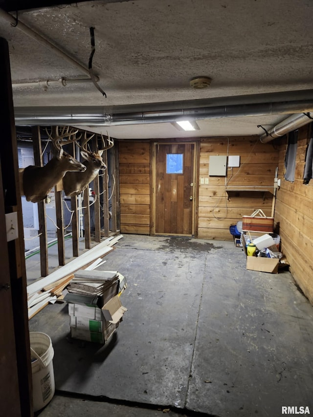 basement with wood walls