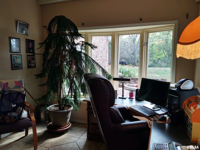20366 Noisy Goose Ln, Olive Branch, IL 62969 - office area with plenty of natural light and tile patterned flooring