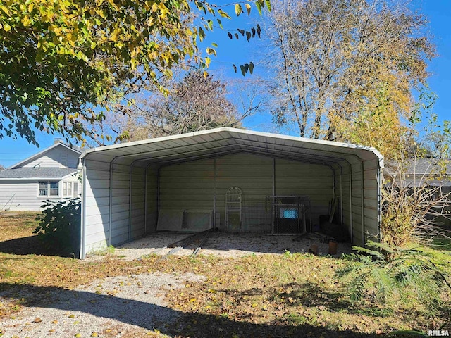 exterior space with a carport