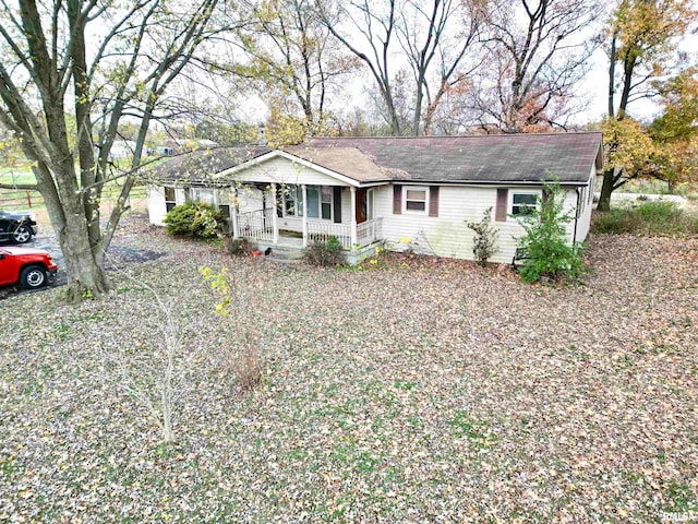 single story home with covered porch