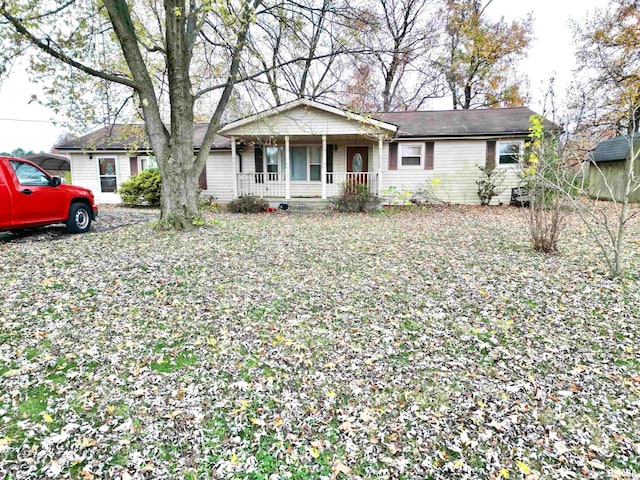 ranch-style home with covered porch