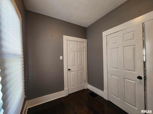 interior space featuring dark wood-type flooring