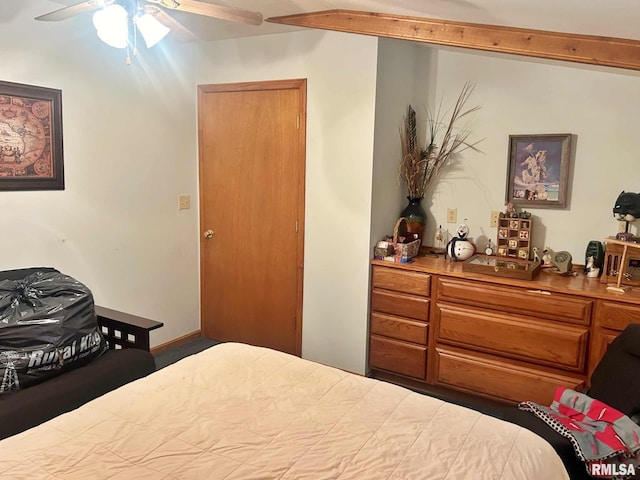 bedroom with beam ceiling and ceiling fan