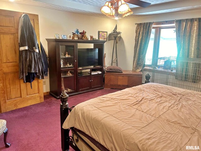 bedroom with dark carpet and ceiling fan