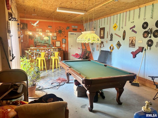 rec room with pool table and concrete floors