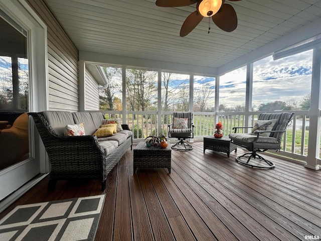 sunroom / solarium with ceiling fan